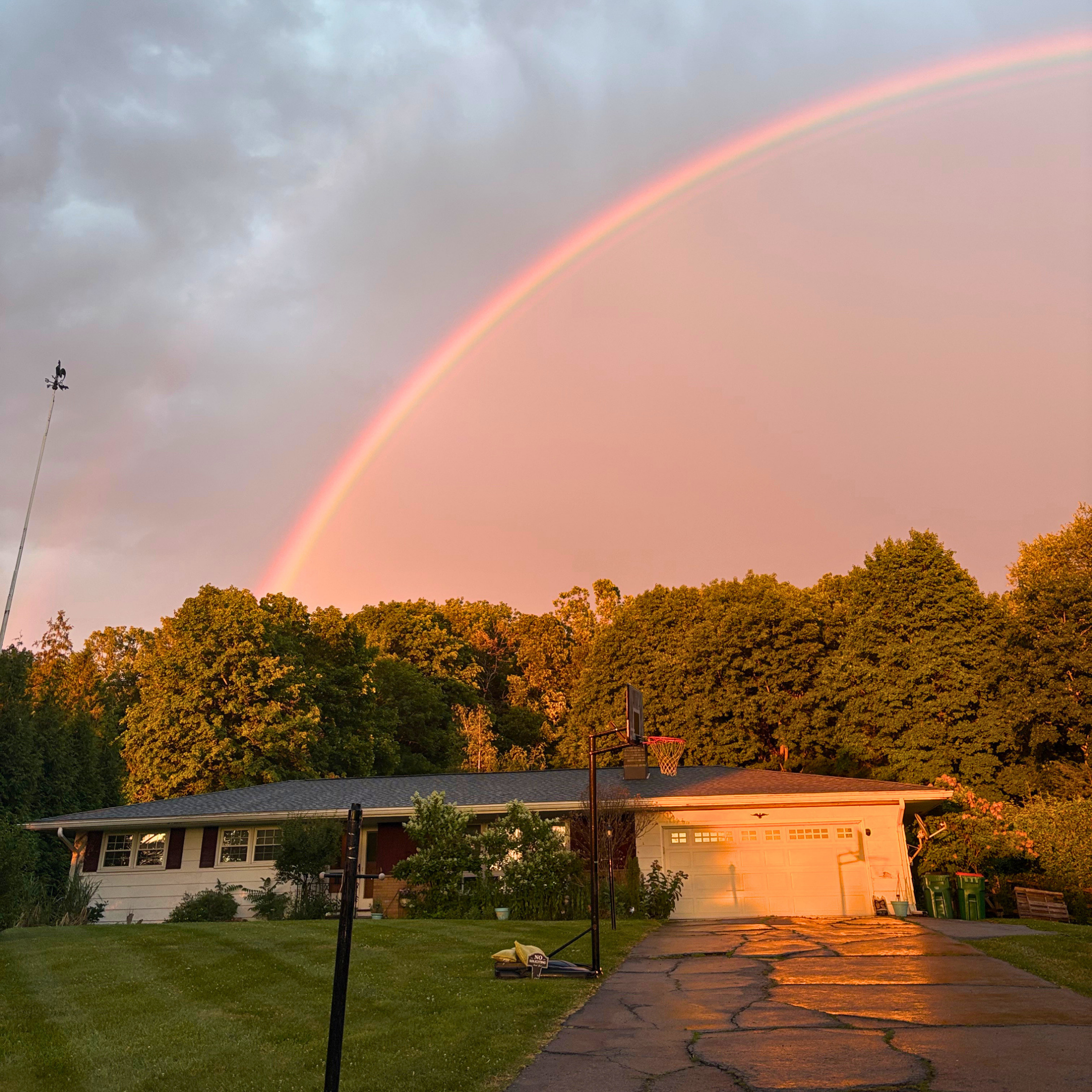 Rainbow over a ranch style home in Frick You Neglected House; I'm Gonna Make You Awesome